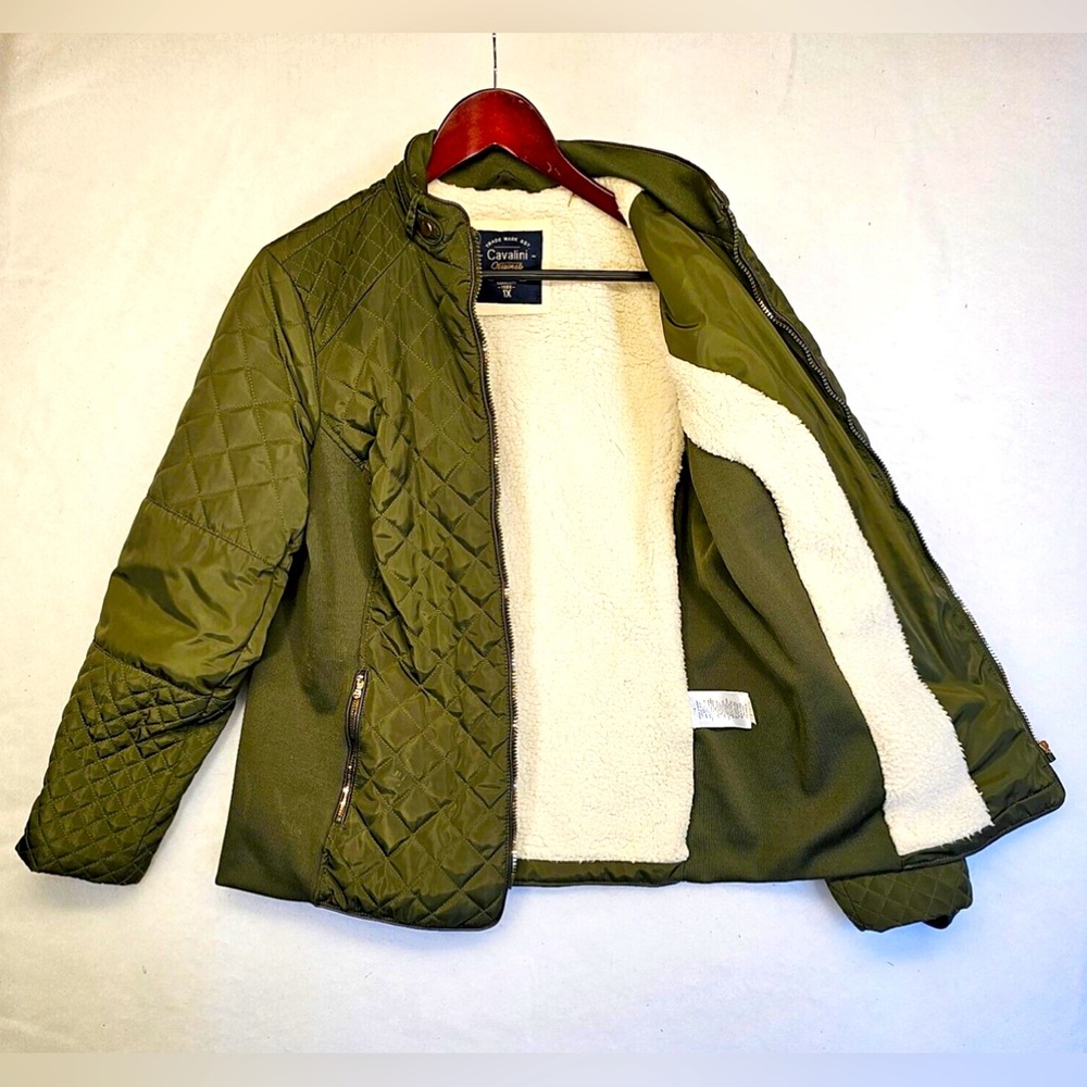 Olive green coat.